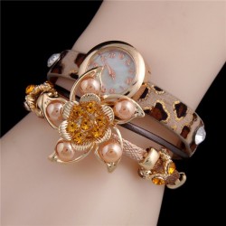 Reloj de pulsera de leopardo con flor de cristal